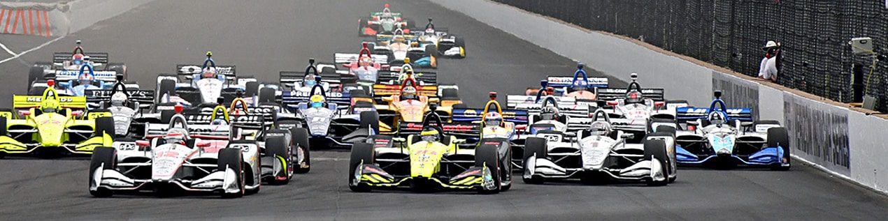 indy cars racing to through the start line Anchorage